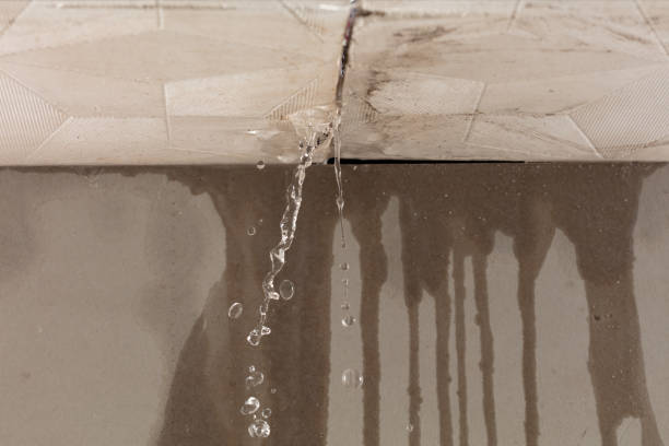 Professional Flood Damage Cleanup technician working in West Liberty, IA
